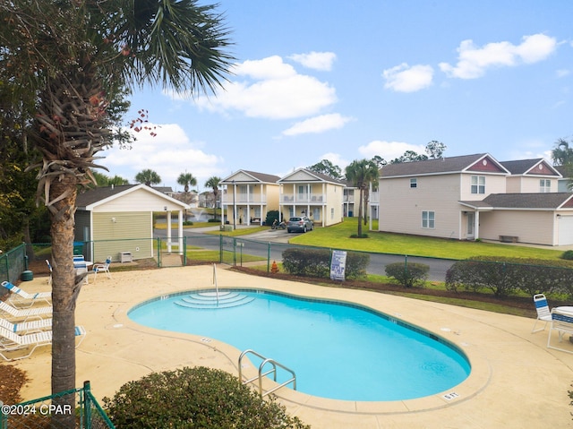 view of pool featuring a patio area