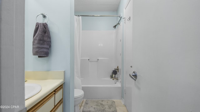 full bathroom featuring toilet, tile patterned flooring, shower / bath combo, and vanity