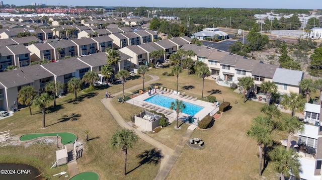 birds eye view of property with a residential view