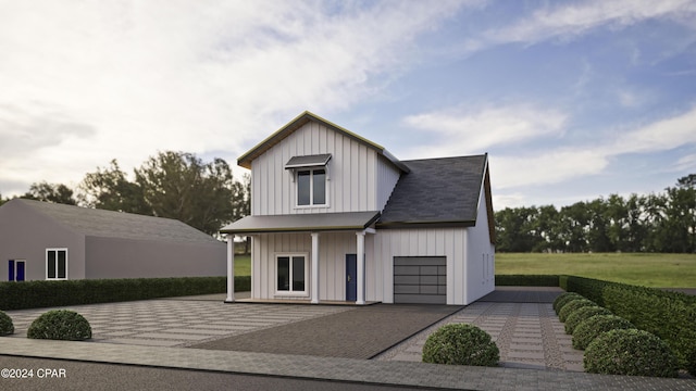 modern farmhouse style home featuring a garage