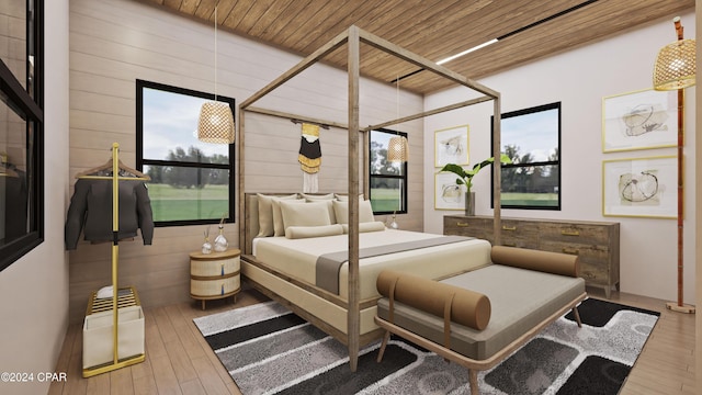 bedroom with multiple windows, hardwood / wood-style floors, and wood ceiling