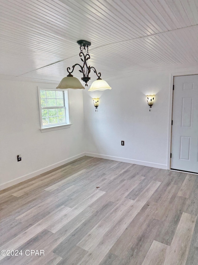 unfurnished dining area featuring light hardwood / wood-style floors