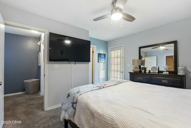 bedroom featuring dark colored carpet, ceiling fan, and baseboards