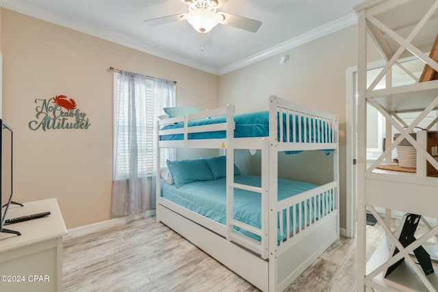 313 Laureno Pl, Panama City Beach, FL 32413 - bedroom featuring wood-type flooring, crown molding, and ceiling fan