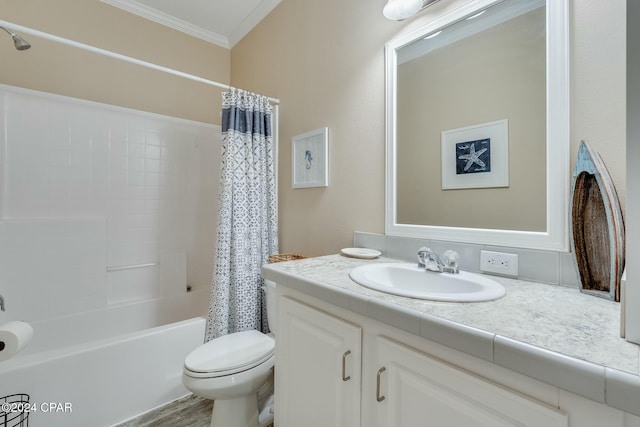 313 Laureno Pl, Panama City Beach, FL 32413 - full bathroom featuring crown molding, hardwood / wood-style flooring, shower / tub combo, vanity, and toilet