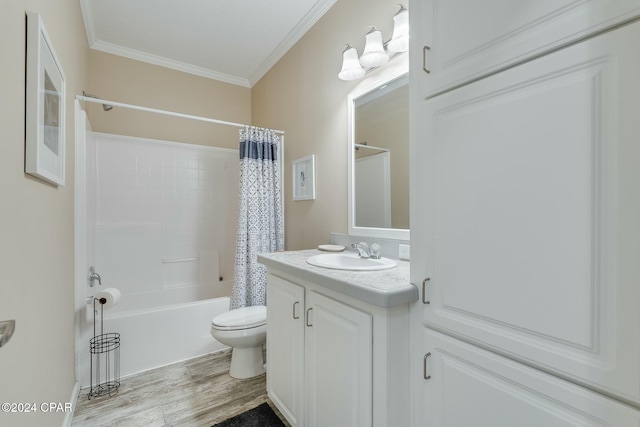 313 Laureno Pl, Panama City Beach, FL 32413 - full bathroom with hardwood / wood-style flooring, vanity, shower / tub combo, toilet, and crown molding