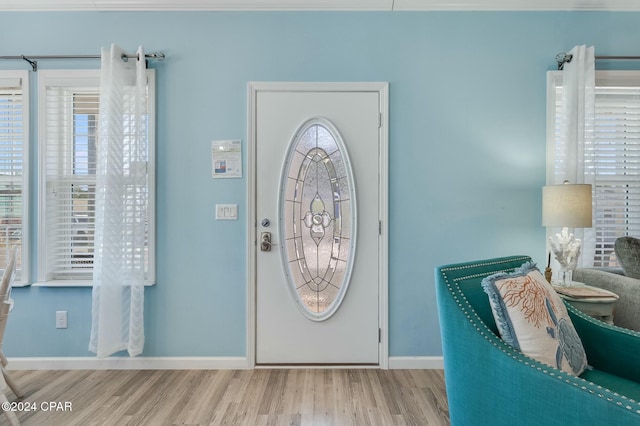 313 Laureno Pl, Panama City Beach, FL 32413 - foyer entrance with light hardwood / wood-style floors