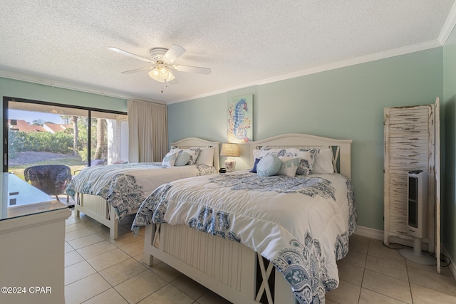 tiled bedroom featuring ceiling fan, ornamental molding, a textured ceiling, and heating unit