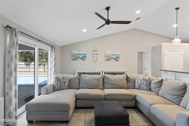 living room featuring light tile patterned floors, vaulted ceiling, and ceiling fan