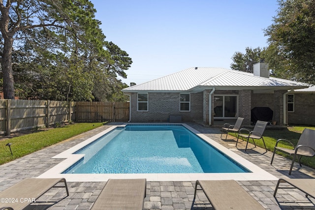 view of pool with a patio