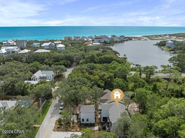 drone / aerial view with a water view