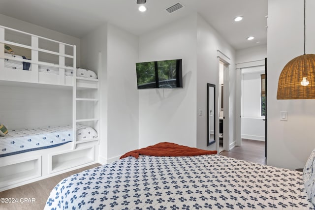 bedroom featuring hardwood / wood-style flooring