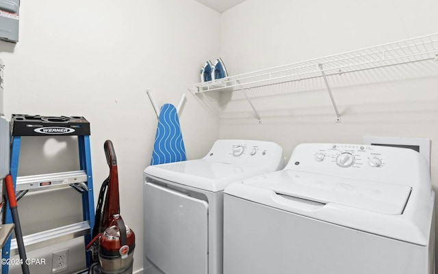 laundry area with separate washer and dryer