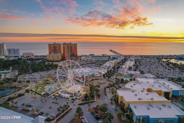 aerial view at dusk with a water view