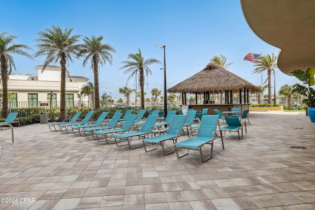 exterior space with a gazebo and an outdoor bar