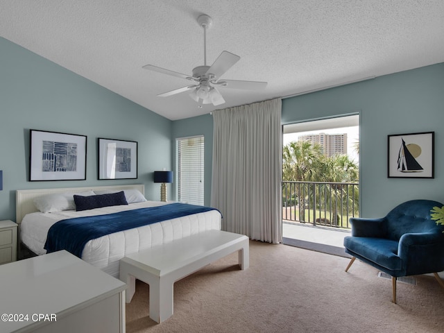 bedroom with access to outside, vaulted ceiling, ceiling fan, a textured ceiling, and light colored carpet