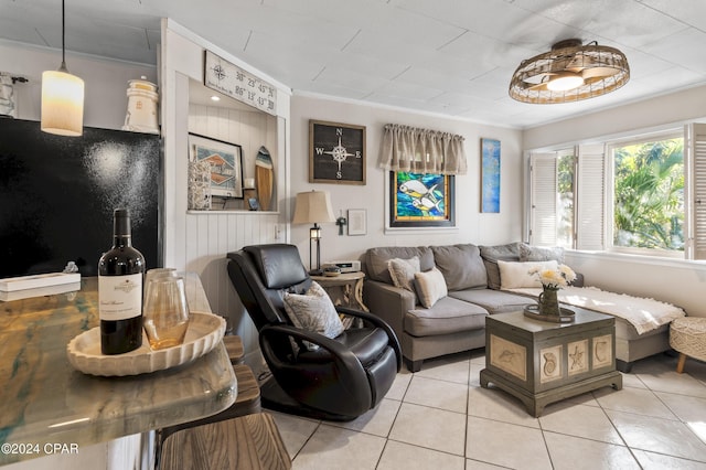 tiled living room with ornamental molding