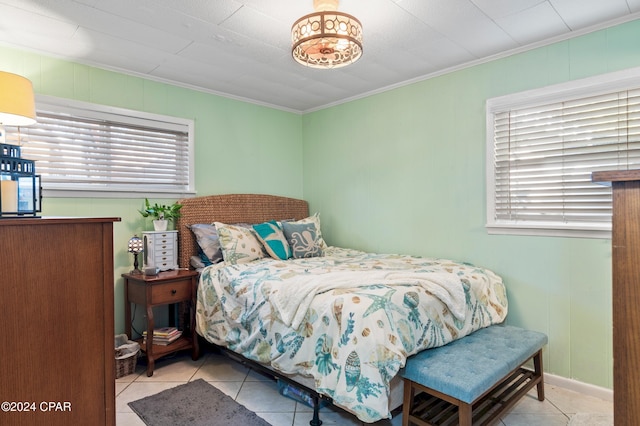 tiled bedroom with crown molding