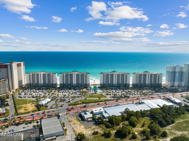 drone / aerial view with a water view