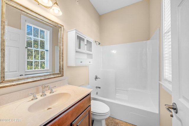 full bathroom with vanity, toilet, and washtub / shower combination