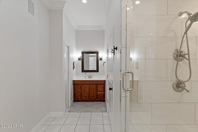 bathroom featuring tile patterned floors, vanity, an enclosed shower, and ornamental molding