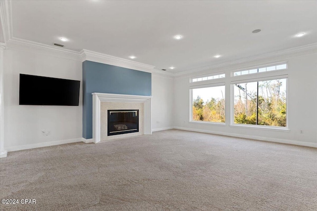 unfurnished living room featuring light colored carpet and ornamental molding