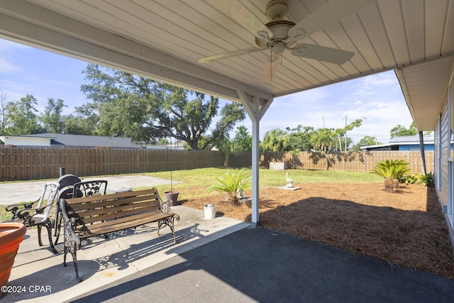 view of patio featuring ceiling fan