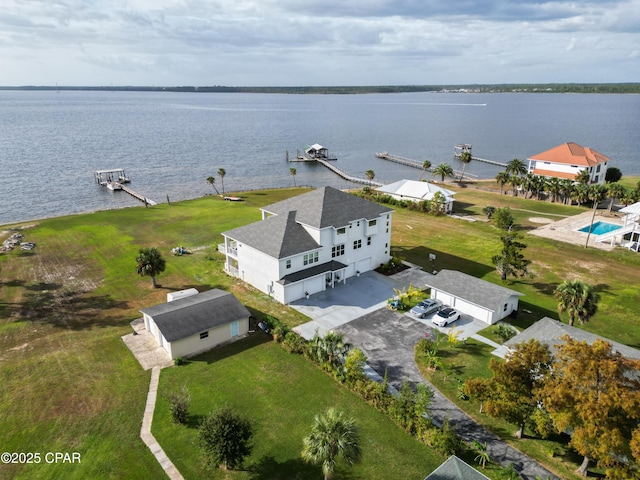 birds eye view of property featuring a water view