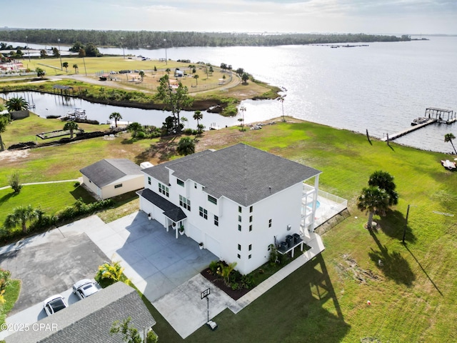 drone / aerial view with a water view