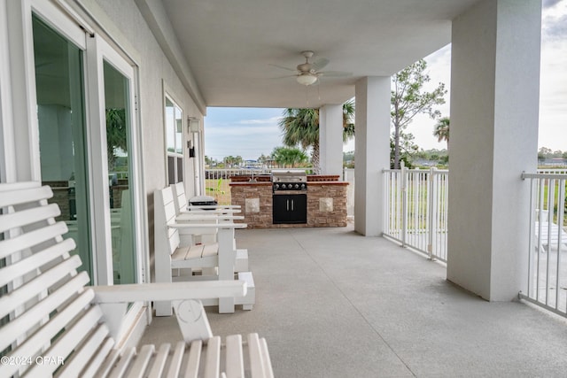 view of patio with grilling area, ceiling fan, and area for grilling