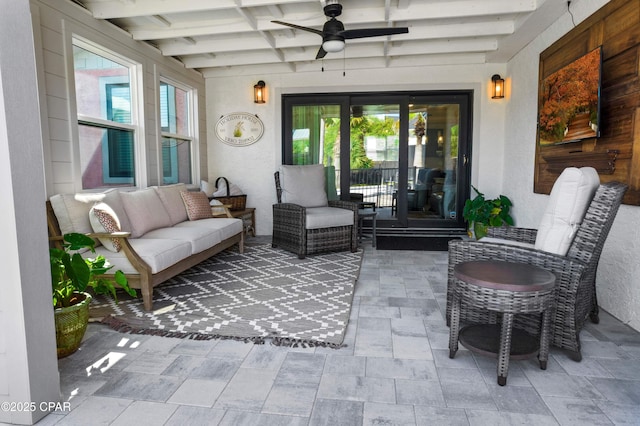 view of patio / terrace featuring outdoor lounge area, ceiling fan, and french doors