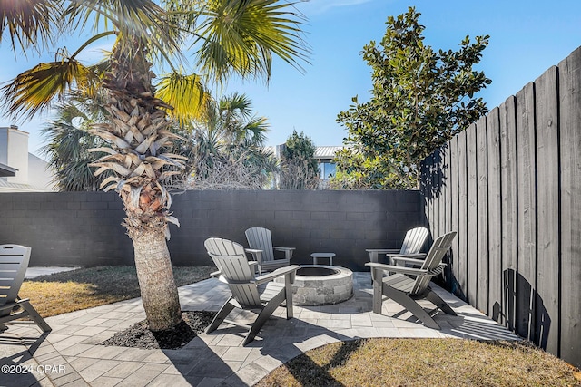 view of patio featuring an outdoor fire pit