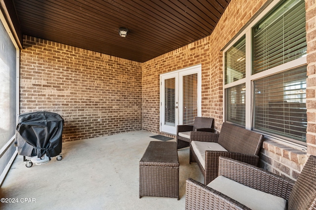 view of patio with a grill and french doors