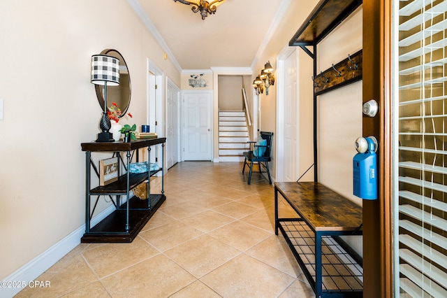 corridor with tile patterned floors and crown molding