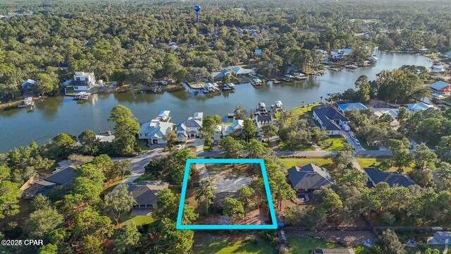 aerial view with a water view and a residential view