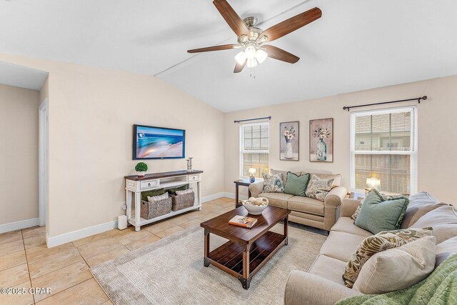 unfurnished bedroom with a raised ceiling, a walk in closet, ceiling fan, and wood-type flooring