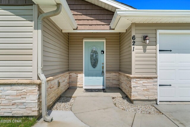 property entrance featuring a garage