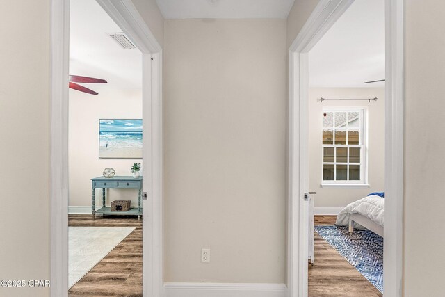 unfurnished room featuring dark hardwood / wood-style floors and ceiling fan