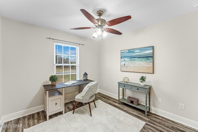 unfurnished bedroom featuring ceiling fan, dark wood-type flooring, and a closet