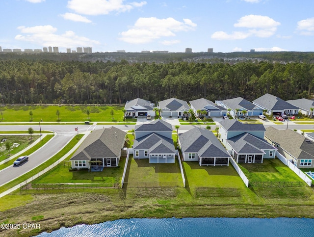 drone / aerial view with a water view