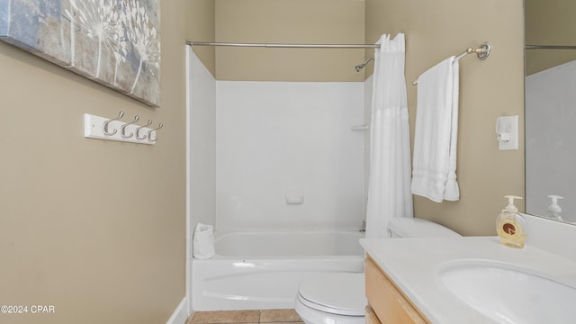 full bathroom featuring tile patterned floors, vanity, toilet, and shower / tub combo