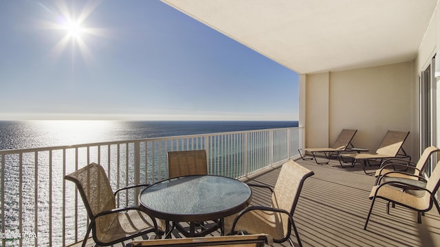 balcony featuring a water view