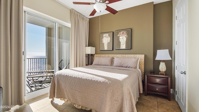 tiled bedroom with access to exterior and ceiling fan