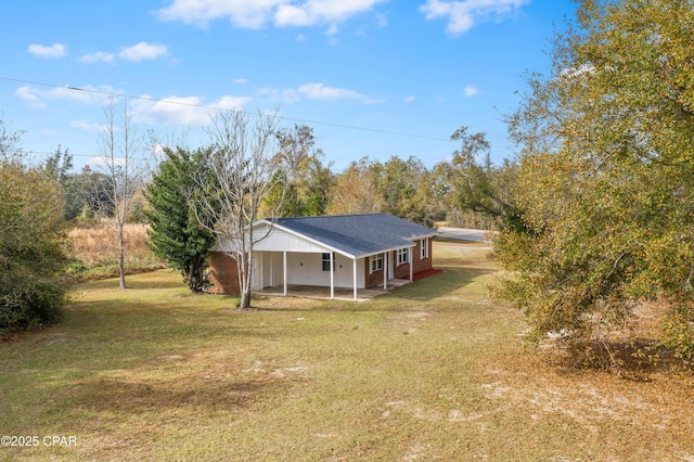 exterior space featuring a front lawn