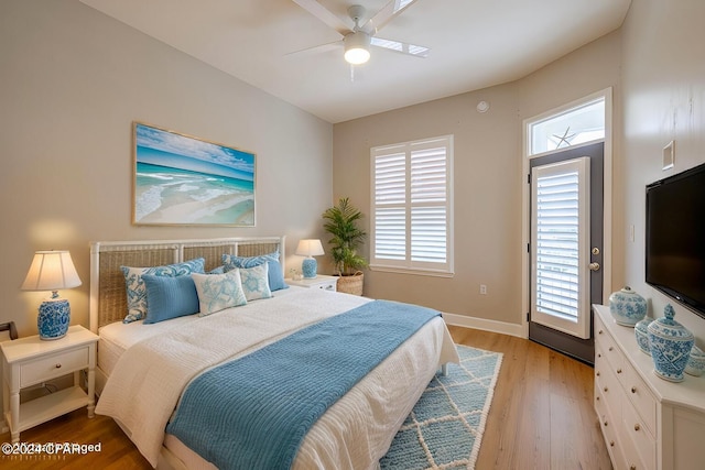 bedroom featuring ceiling fan and light hardwood / wood-style flooring