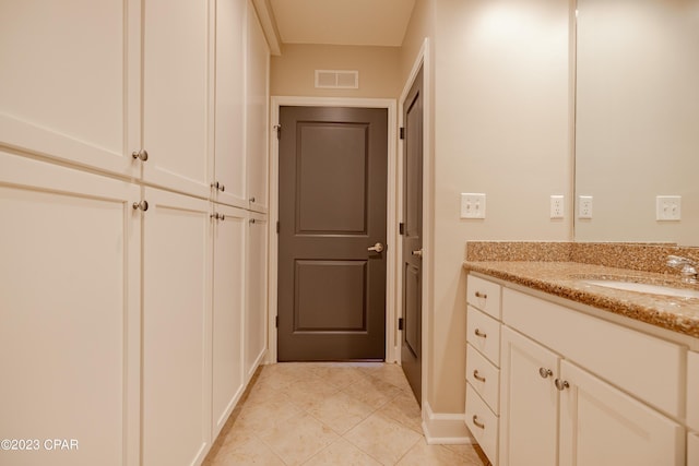 8700 Front Beach Rd Unit 5302, Panama City Beach, FL 32407 - bathroom featuring baseboards, visible vents, tile patterned floors, and vanity