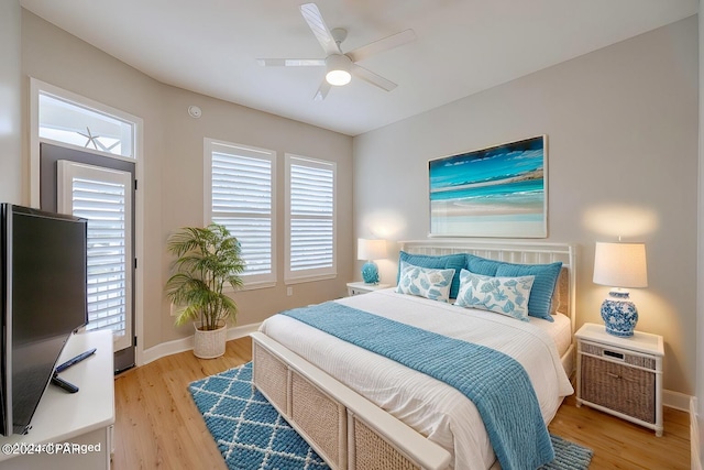 bedroom featuring ceiling fan and light wood-type flooring