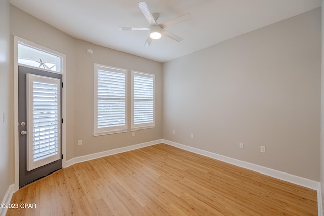 8700 Front Beach Rd Unit 5302, Panama City Beach, FL 32407 - spare room featuring baseboards, light wood-style floors, and ceiling fan