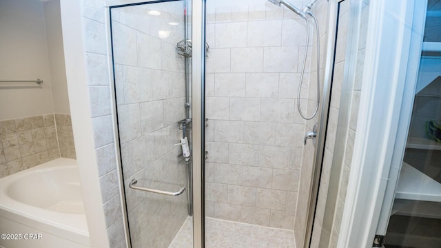 bathroom with independent shower and bath