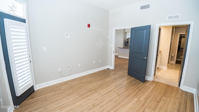 unfurnished bedroom featuring light hardwood / wood-style floors